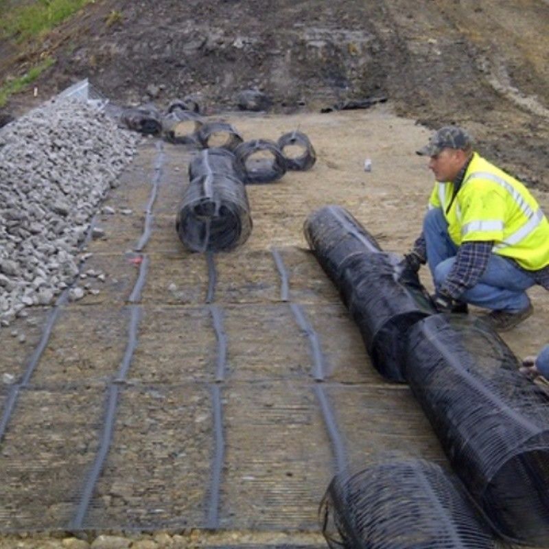 Geo Grid Ground Grid Plastic Uniaxial Polyester Geogrid Uniaxial Gravle Grid Ground cho tầng hầm đường lái xe