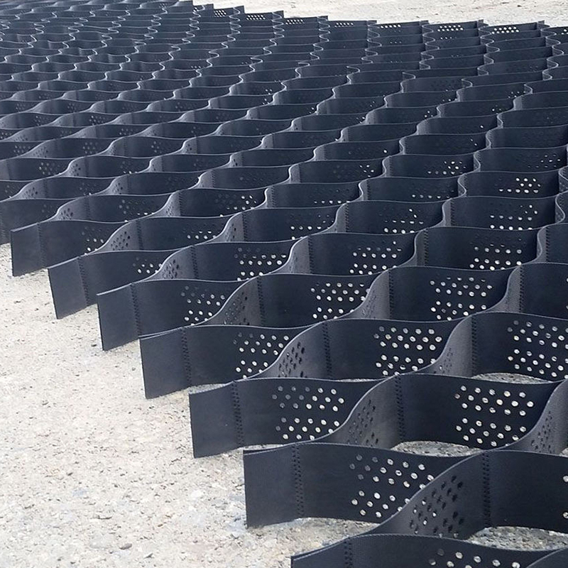 Lưới địa kỹ thuật HDPE bằng nhựa có kết cấu và đục lỗ để ổn định đường lái xe, gia cố nền đường, bãi đậu xe và bảo vệ sườn dốc