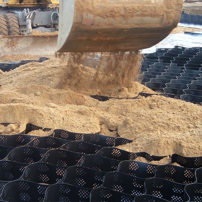Lưới địa kỹ thuật HDPE bằng nhựa có kết cấu và đục lỗ để ổn định đường lái xe, gia cố nền đường, bãi đậu xe và bảo vệ sườn dốc