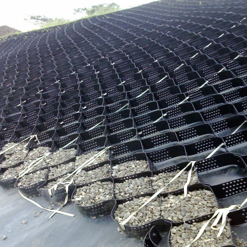 Lưới địa kỹ thuật HDPE bằng nhựa có kết cấu và đục lỗ để ổn định đường lái xe, gia cố nền đường, bãi đậu xe và bảo vệ sườn dốc