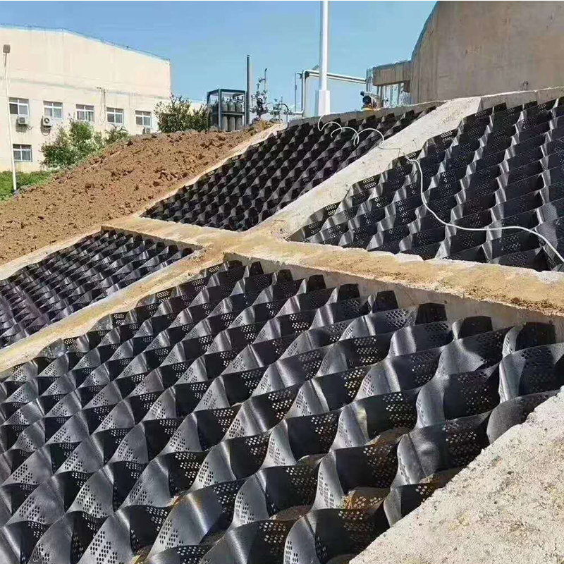 Lưới địa kỹ thuật HDPE bằng nhựa có kết cấu và đục lỗ để ổn định đường lái xe, gia cố nền đường, bãi đậu xe và bảo vệ sườn dốc